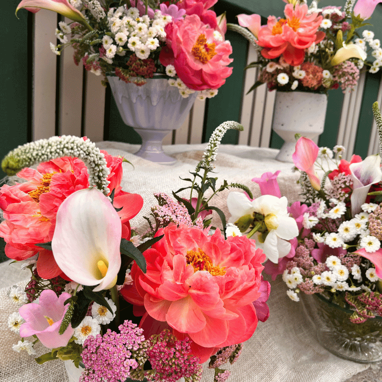 sustainably grown peony arrangements in 3 white textured compote vases